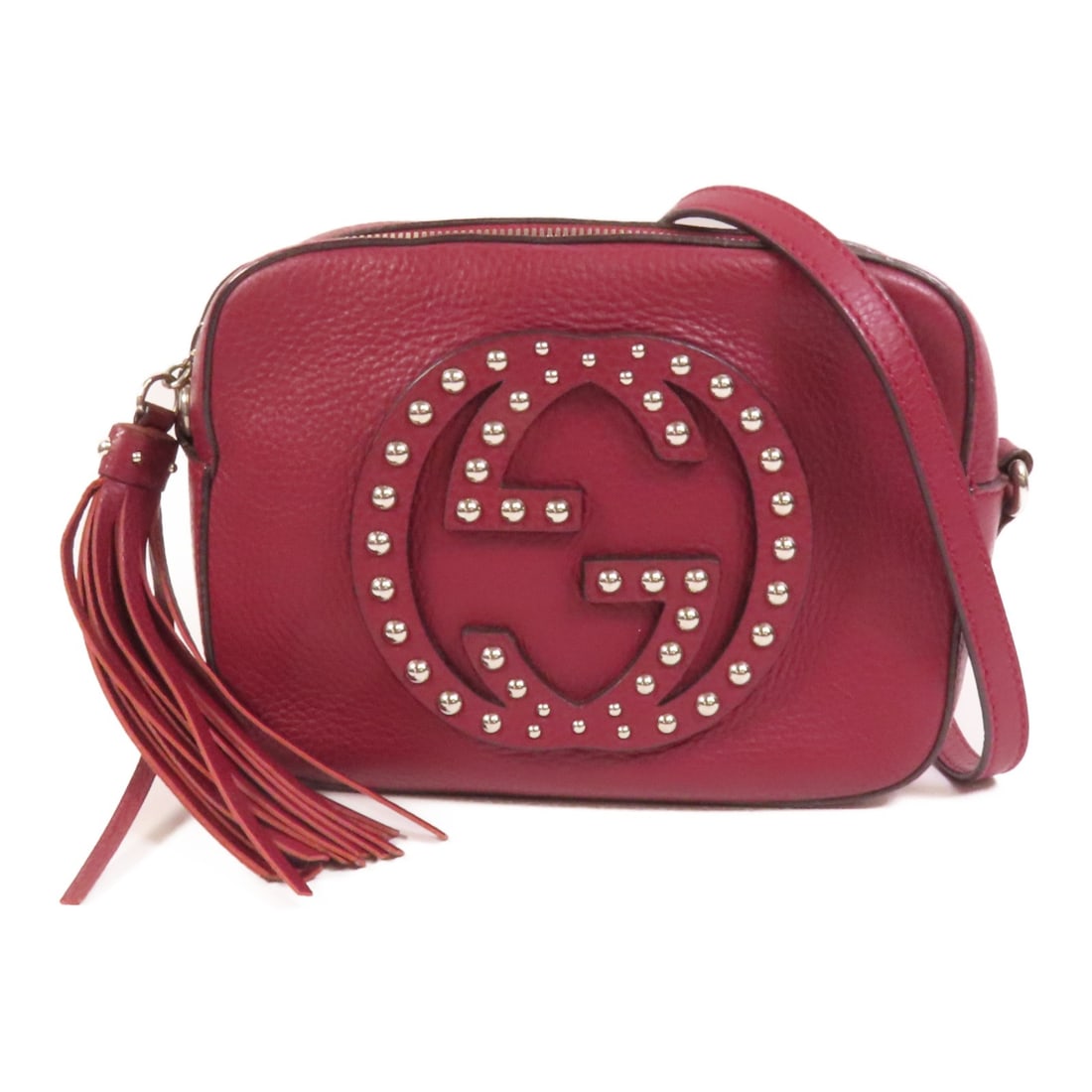 Red Calfskin Gucci Soho Disco Studded Shoulder Bag with Silver Hardware: Red Calfskin Gucci Soho Disco Studded Shoulder Bag with Silver Hardware This Gucci GG Soho Disco shoulder bag features a striking red calfskin leather exterior with studded accents. It offers a compac