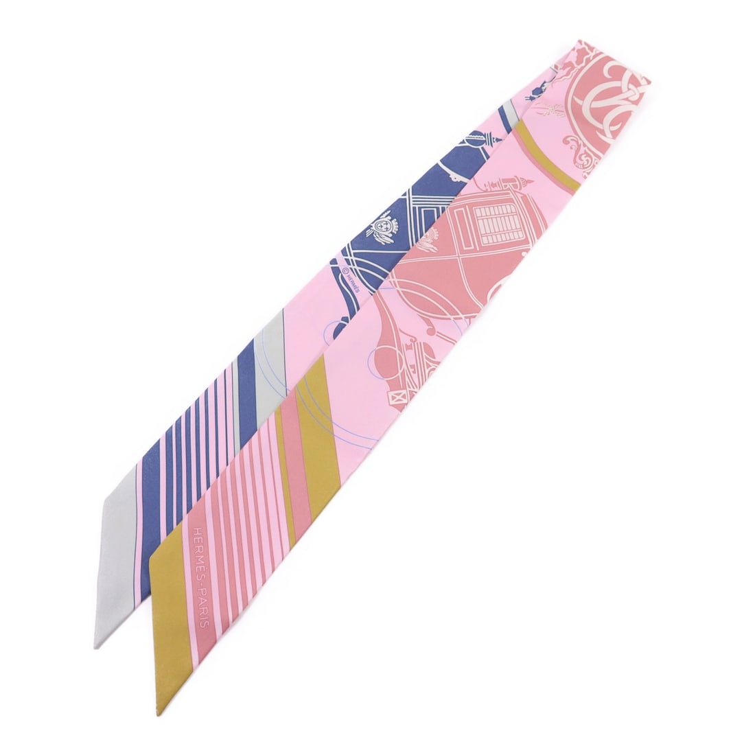 Twilly Silk Scarf by Hermes in Multicolor: Twilly Silk Scarf by Hermes in Multicolor This Hermes Twilly scarf is crafted from luxurious silk and features a vibrant multicolor design. Made in France, it offers a versatile accessory option for a