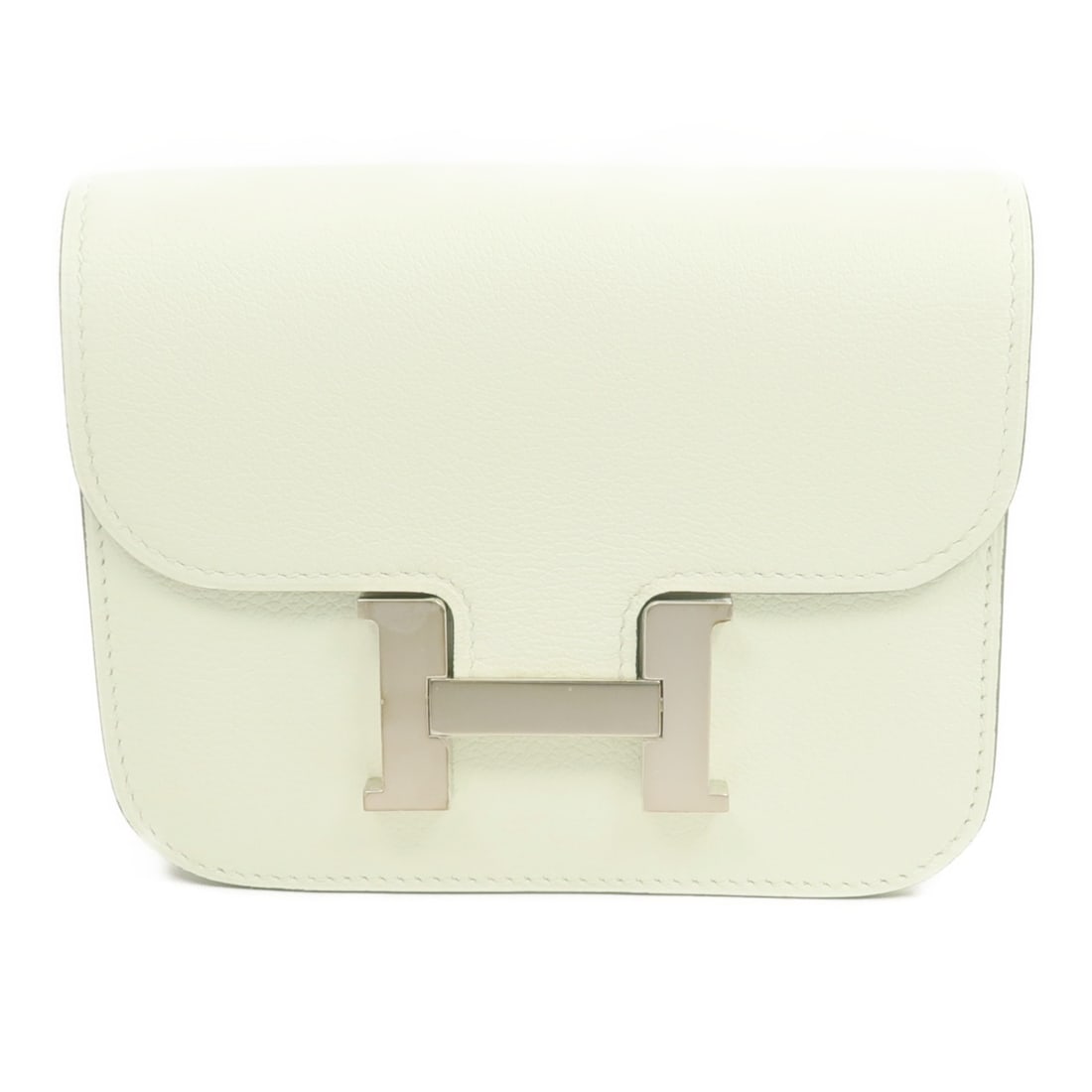 Constance Slim Green Evercolor Leather Wallet by Hermes with Palladium Hardware: Constance Slim Green Evercolor Leather Wallet by Hermes with Palladium Hardware Hermes Constance Slim bi-fold wallet crafted from Evercolor calfskin leather in a green hue. Features a sleek design wit