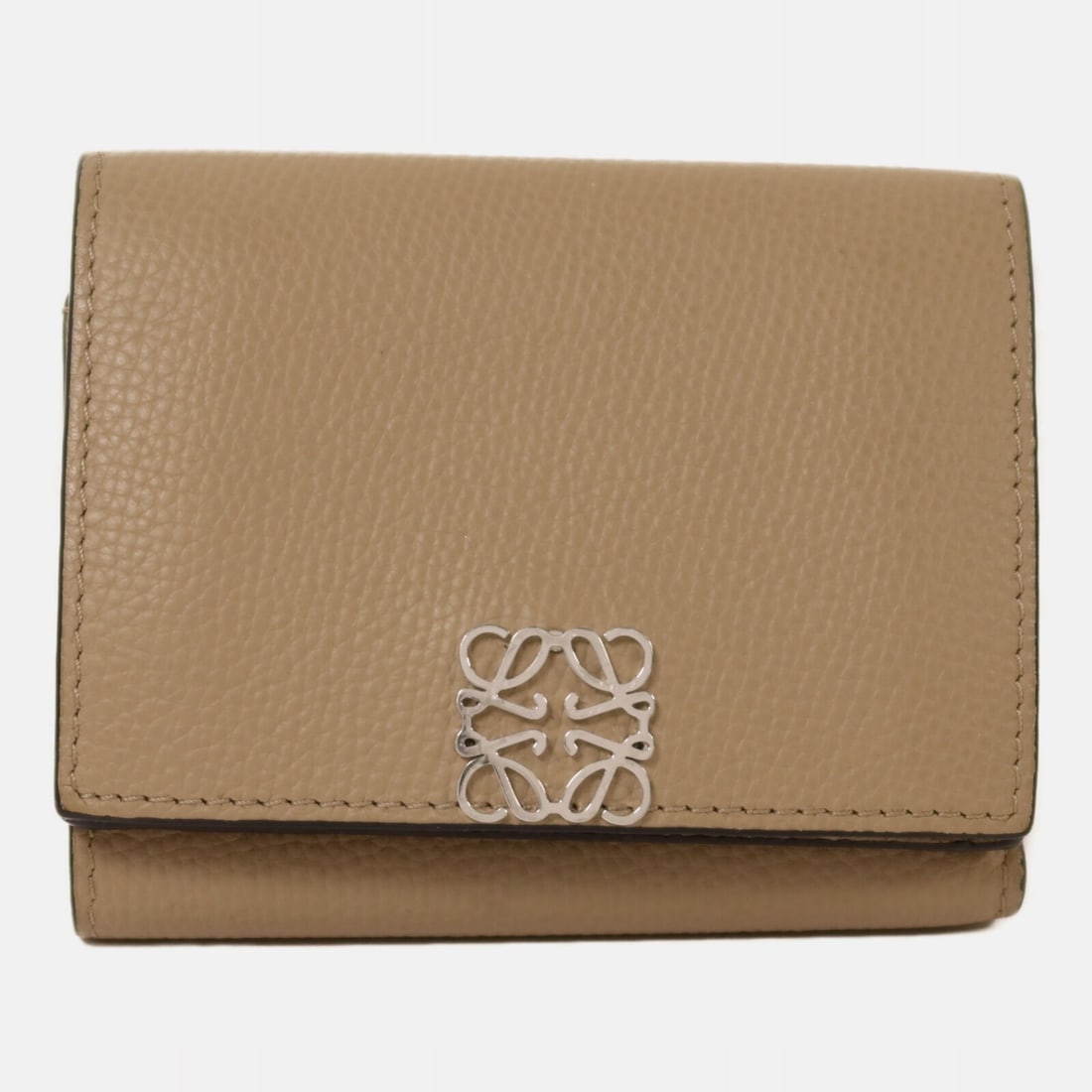 Gray Calfskin Trifold Wallet by LOEWE with Silver Hardware: Gray Calfskin Trifold Wallet by LOEWE with Silver Hardware This LOEWE tri-fold wallet is crafted from high-quality calfskin leather in a sophisticated gray color. Made in Spain, it features a stylish