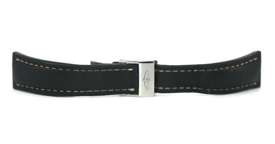 Authentic Breitling Black Leather Wristwatch Band 24mm: Authentic Breitling Black Leather Wristwatch Band 24mm This authentic Breitling black leather strap is designed for wristwatches and features a band width of 24 mm. The strap is crafted from high-qual