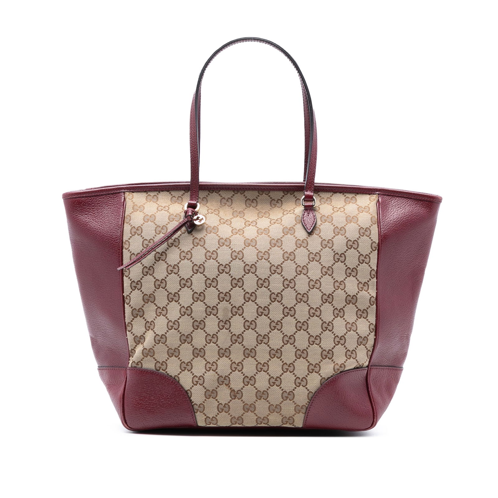 Brown Gucci Bree Tote Bag in GG Canvas with Leather Trim: Brown Gucci Bree Tote Bag in GG Canvas with Leather Trim This Gucci GG Canvas Bree Tote features a canvas body with leather trim, flat leather handles, a top zip closure, and interior zip and slip poc