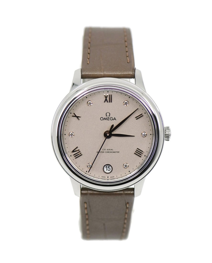 De Ville Prestige 34mm Grey Dial Diamond Bezel Automatic Watch by Omega: De Ville Prestige 34mm Grey Dial Diamond Bezel Automatic Watch by Omega This Omega DeVille Prestige wristwatch features a 34 mm stainless steel case and a grey analog dial accented with a diamond beze