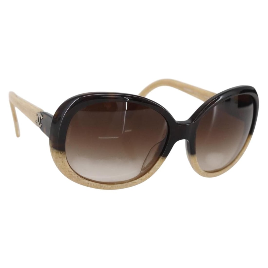 CHANEL Beige Plastic Sunglasses with Case Made in Italy: CHANEL Beige Plastic Sunglasses with Case Made in Italy Elevate your accessory game with these authentic CHANEL sunglasses, crafted in Italy. Featuring a chic beige plastic frame, these sunglasses emb