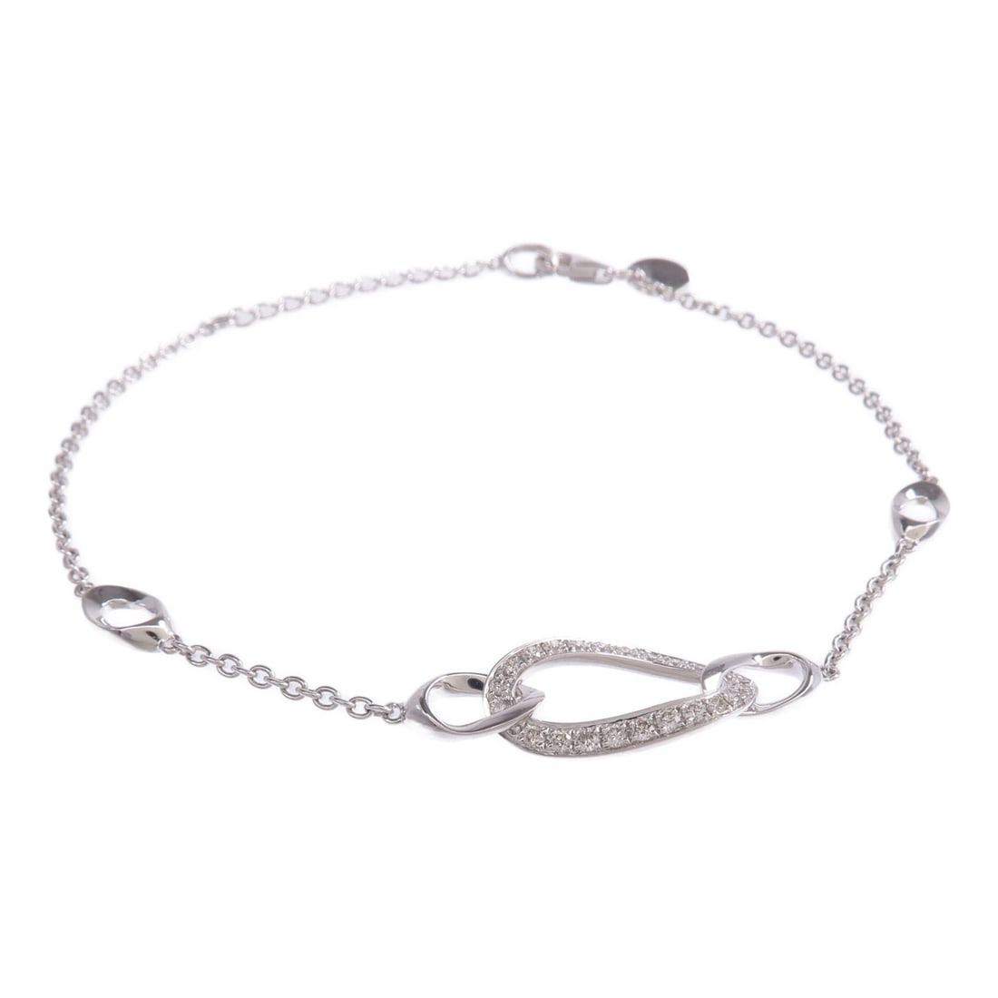 18K White Gold Diamond Bracelet by JEWELRY: 18K White Gold Diamond Bracelet by JEWELRY This elegant bracelet features diamonds set in 18K white gold, offering a timeless and sophisticated accessory. The clear diamonds provide a classic sparkle,