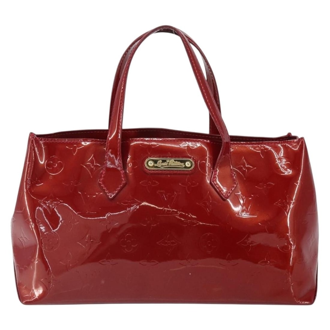 Red Patent Leather Wilshire Tote by Louis Vuitton Monogram Vernis: Red Patent Leather Wilshire Tote by Louis Vuitton Monogram Vernis The Louis Vuitton Wilshire Handbag in red Monogram Vernis patent leather offers a stylish and practical design for women. This handbag