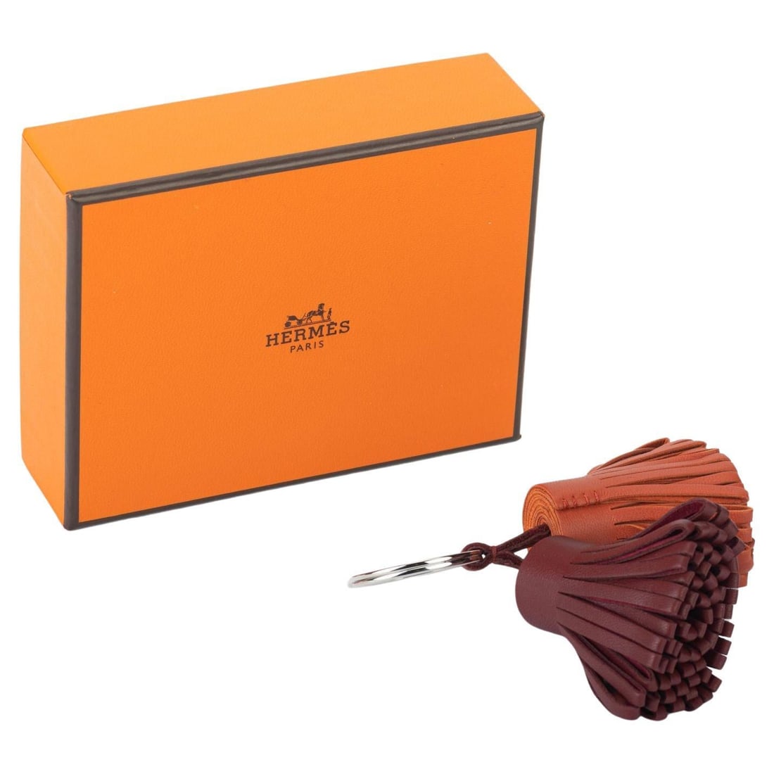 Hermes Double Carmen Bag Charm New in Box France: Hermes Double Carmen Bag Charm New in Box France Introducing the exquisite Hermes Double Carmen Bag Charm, a stunning accessory that adds a touch of elegance to your handbag. This designer charm measu