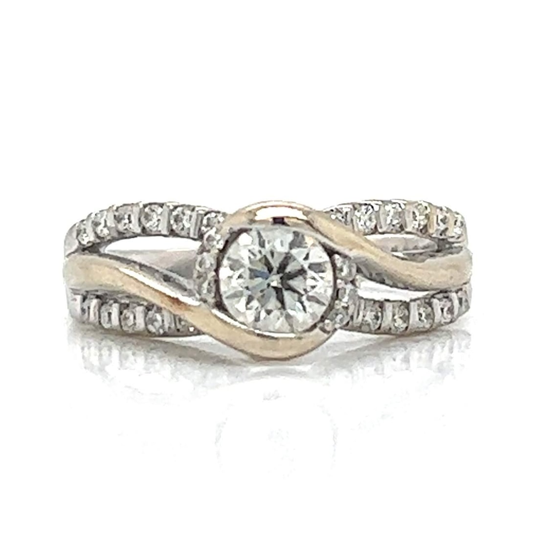 SIRENA 14K White Gold Diamond Ring 0.70 Ct Center 28 Diamonds: SIRENA 14K White Gold Diamond Ring 0.70 Ct Center 28 Diamonds This exquisite SIRENA ring is crafted from 14K white gold and features a stunning 0.70 Ct. diamond at its center, showcasing H color and V