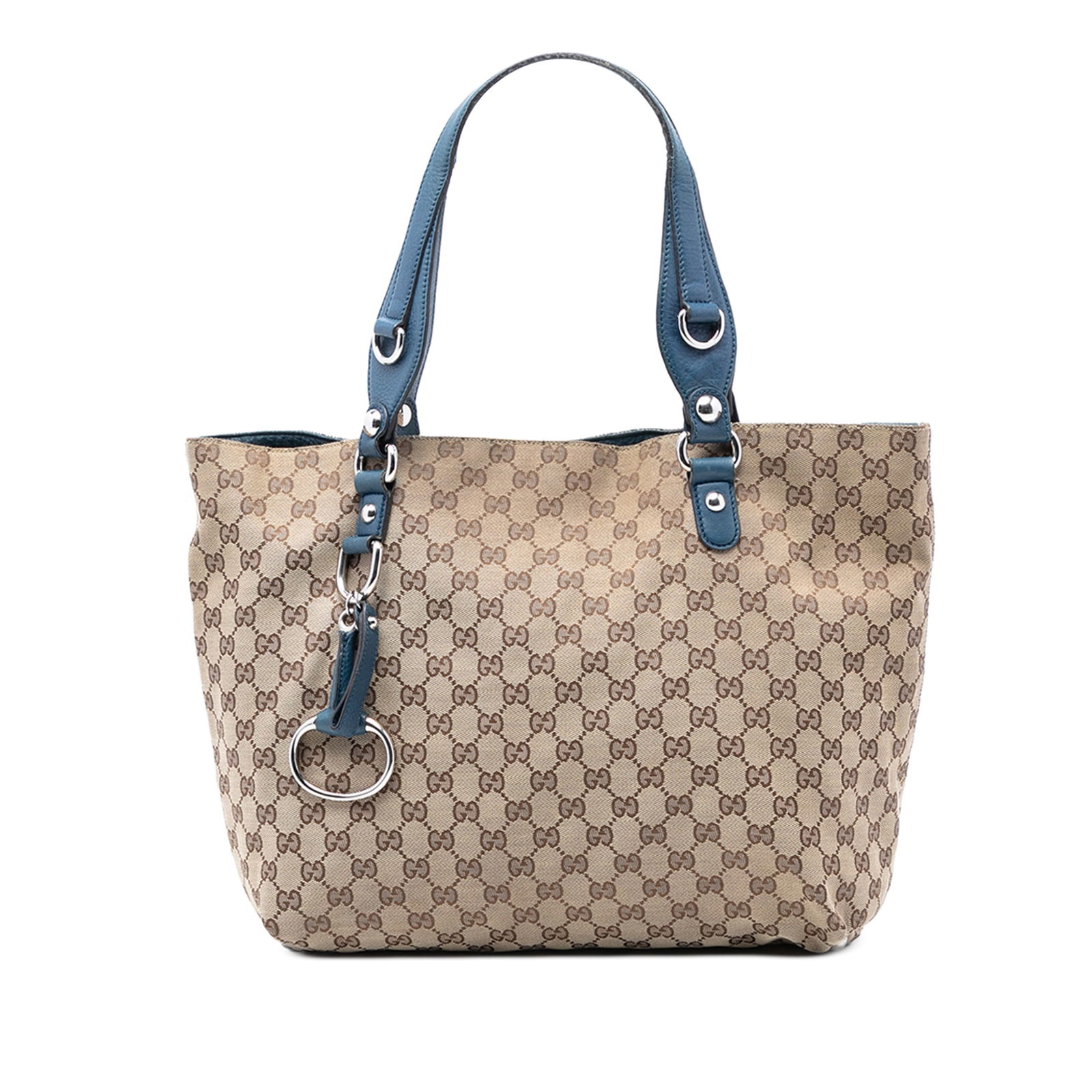 Gucci Medium GG Canvas Icon Bit Brown Tote with Leather Trim: Gucci Medium GG Canvas Icon Bit Brown Tote with Leather Trim This Gucci Medium GG Canvas Icon Bit Tote features a durable canvas body with leather trim, flat leather straps, an open top with a magneti