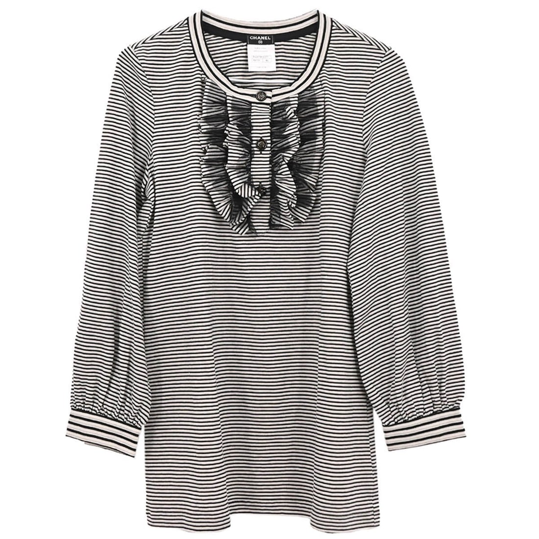 Vintage Chanel Black Cotton T-Shirt with Button Closure Size 40: Vintage Chanel Black Cotton T-Shirt with Button Closure Size 40 This vintage Chanel T-shirt features a classic black color with long sleeves and a round neckline, perfect for casual occasions. Crafted