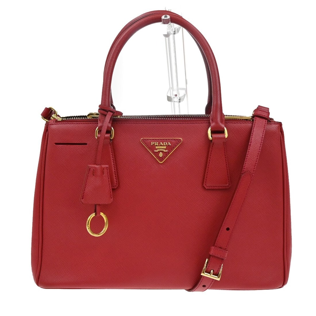 Red Saffiano Leather Galleria Double Zip Tote by Prada: Red Saffiano Leather Galleria Double Zip Tote by Prada This Prada Galleria Double Zip Tote is crafted from red Saffiano leather and features a structured silhouette with dual top handles. The bag is d
