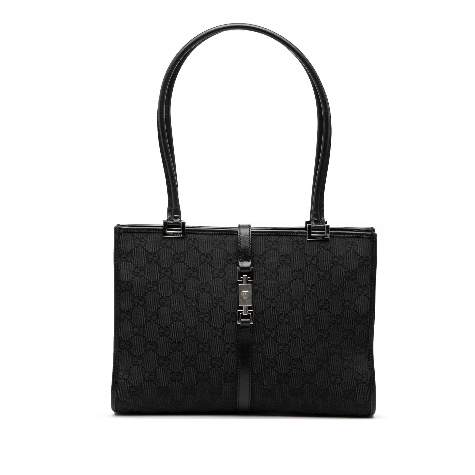 Gucci Jackie Black Canvas Tote Bag with Leather Handles: Gucci Jackie Black Canvas Tote Bag with Leather Handles This Gucci GG Canvas Jackie Tote features a black canvas body with rolled leather handles and an open top secured by a strap and push lock closu