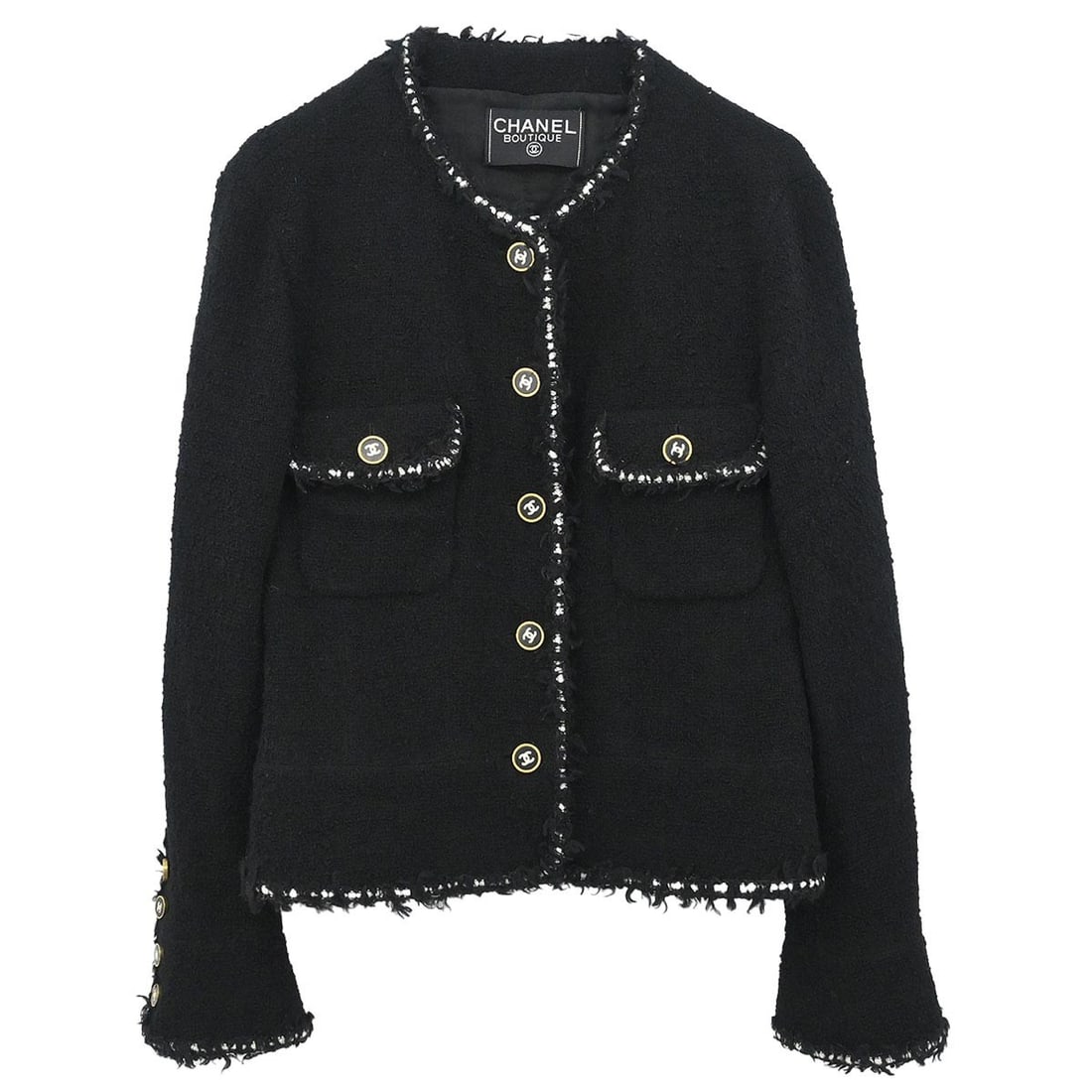 Chanel Black Wool Single Breasted Mid-Length Vintage Jacket: Chanel Black Wool Single Breasted Mid-Length Vintage Jacket This Chanel collarless single-breasted jacket features a mid-length silhouette crafted from 100% wool in classic black. Designed with long s
