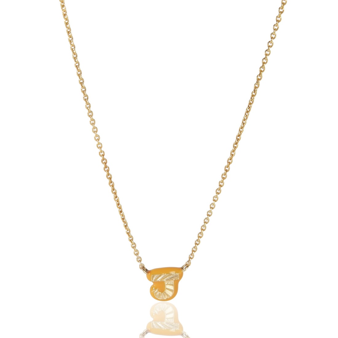 14K Yellow Gold Mini J Pendant with Tan Enamel Accent: 14K Yellow Gold Mini J Pendant with Tan Enamel Accent This pre-owned women's pendant features a mini initial 'J' design crafted from 14K yellow gold with tan enamel detailing. It is part of the Tan En