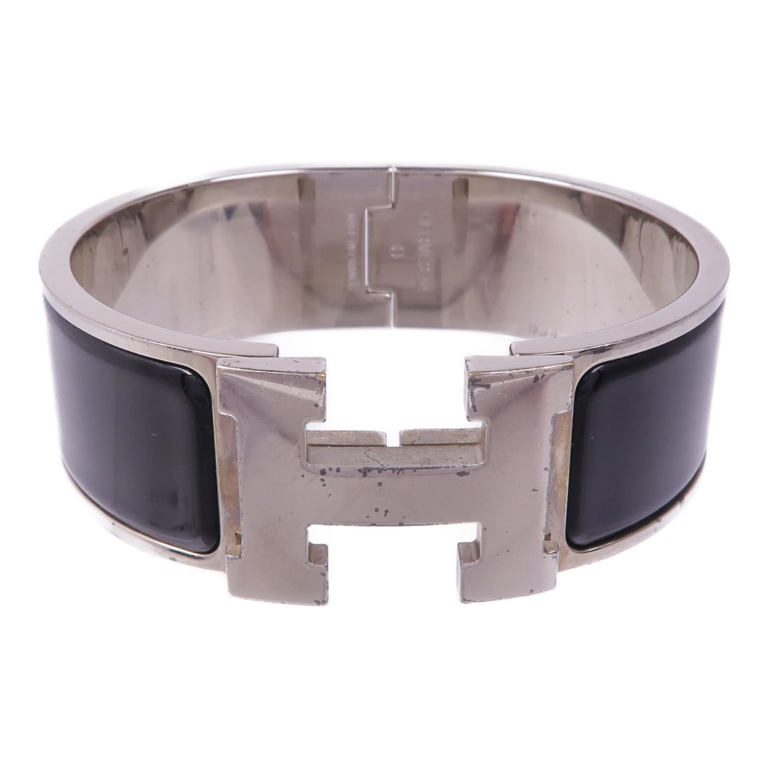 HERMES Clic-Clac H Bracelet Black Enamel Silver Metal: HERMES Clic-Clac H Bracelet Black Enamel Silver Metal This exquisite HERMES Clic-Clac H Bracelet features a sleek design crafted with a combination of metal and enamel materials. The bracelet showcase
