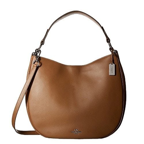 Coach Nomad Hobo Handbag Beige Leather 36026SVSD Adjustable Strap: Coach Nomad Hobo Handbag Beige Leather 36026SVSD Adjustable Strap Elevate your style with this Coach Glovetanned Beige Tan Calf Leather Nomad Hobo Handbag, designed for the modern woman. This spacious