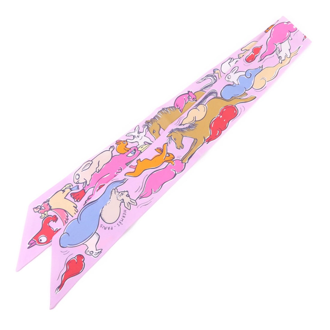 Silk Twilly Scarf in Multicolor by Hermes France: Silk Twilly Scarf in Multicolor by Hermes France This Hermes Twilly scarf features a vibrant multicolor design crafted from luxurious silk. Made in France, it offers a stylish and versatile accessory