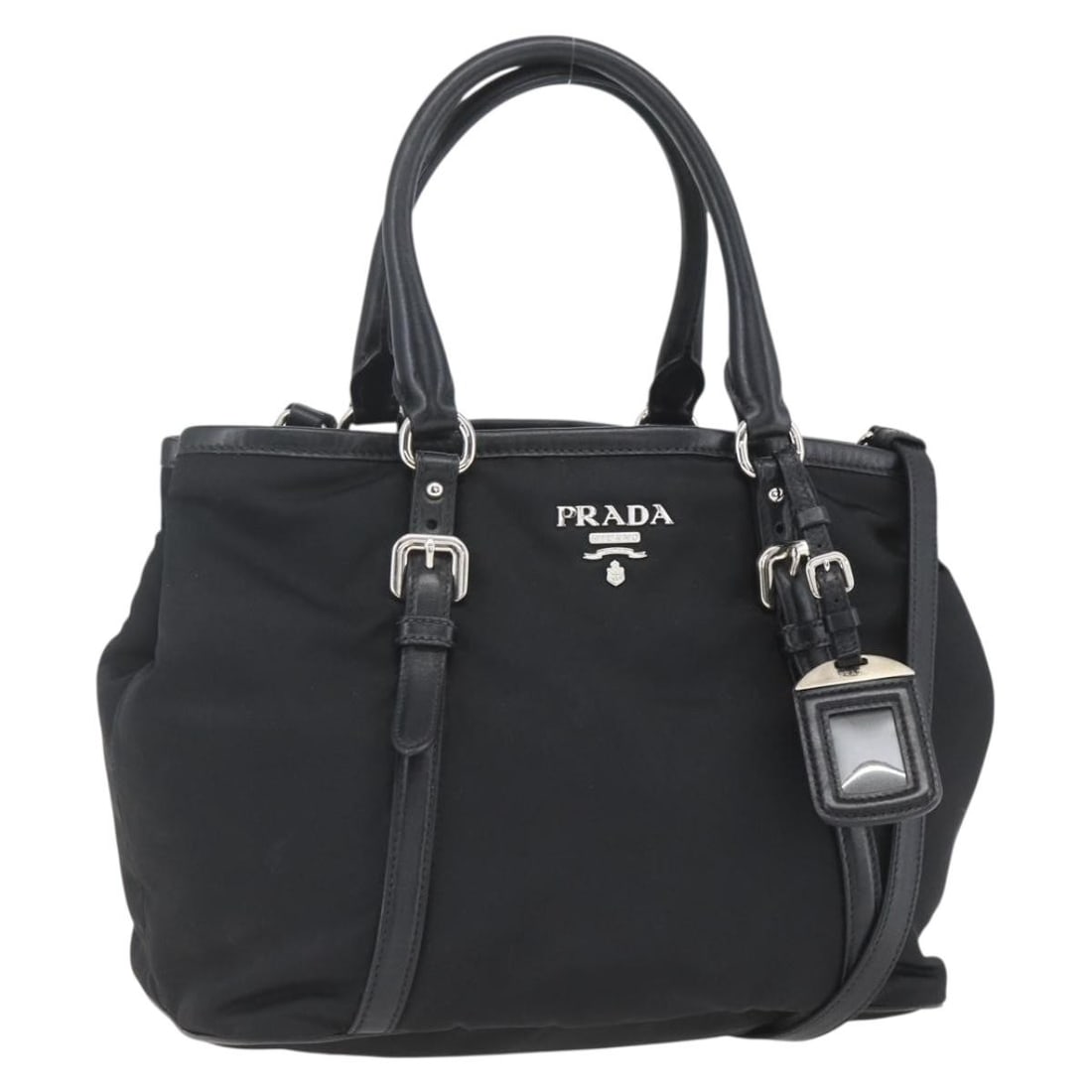 Prada Black Nylon Convertible Handbag with Silver Hardware and Accessories: Prada Black Nylon Convertible Handbag with Silver Hardware and Accessories This PRADA handbag features a versatile 2-way design crafted from durable black nylon with silver-tone accents. Made in Italy