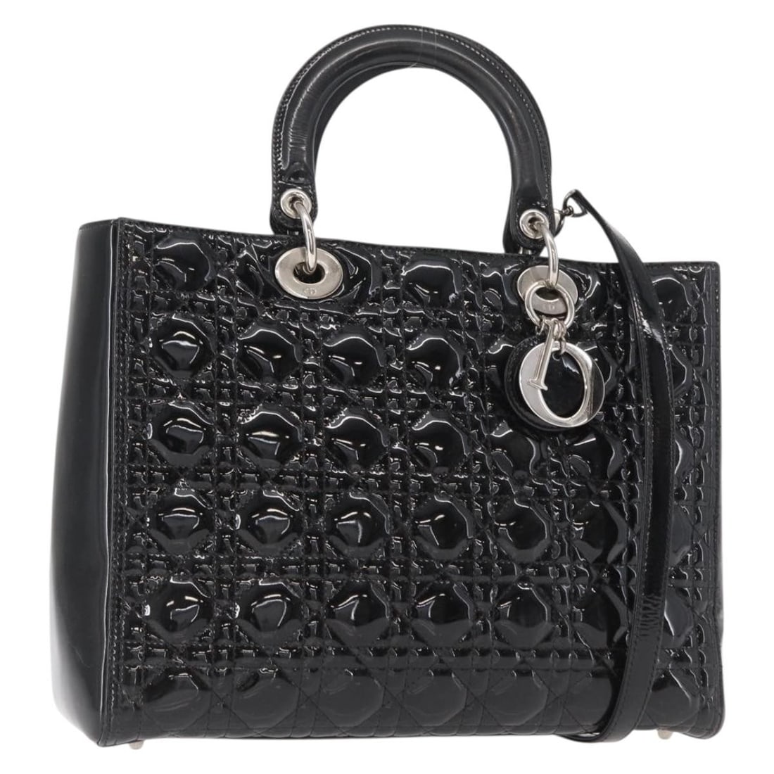 Lady Dior Black Patent Leather Cannage Quilted Handbag by Christian Dior: Lady Dior Black Patent Leather Cannage Quilted Handbag by Christian Dior This pre-owned Lady Dior handbag features the iconic Cannage quilt pattern in black patent leather. Designed for women, it offe