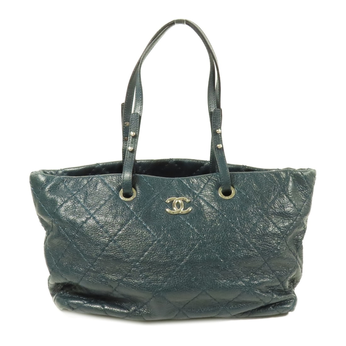 CHANEL Green Calfskin Leather Tote Bag with SHW: CHANEL Green Calfskin Leather Tote Bag with SHW This CHANEL tote bag is a stylish accessory crafted from high-quality calfskin leather in a vibrant green hue. With its spacious design, this bag is per