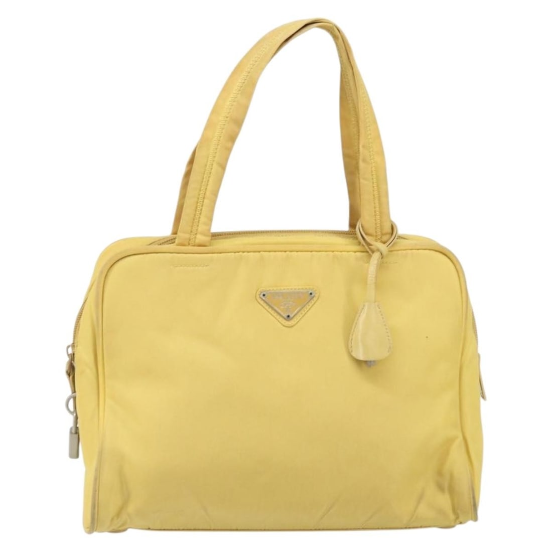 Yellow Nylon Prada Zip Around Tote Bag 28cm by 20cm by 8cm: Yellow Nylon Prada Zip Around Tote Bag 28cm by 20cm by 8cm This Prada Zip Around Tote for women features a yellow nylon exterior with a zip-around closure. It has visible signs of wear including surfa