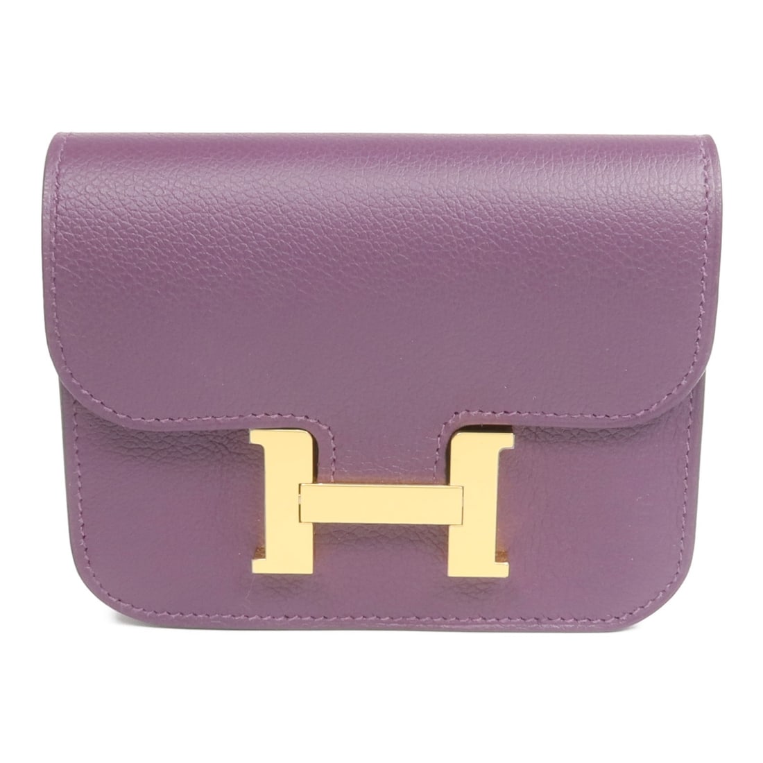 Hermes Constance Slim Purple Evercolor Leather Bifold Wallet with Gold Hardware: Hermes Constance Slim Purple Evercolor Leather Bifold Wallet with Gold Hardware This Hermes Constance Slim bi-fold wallet is crafted from Evercolor calfskin leather in a rich purple shade. Featuring a