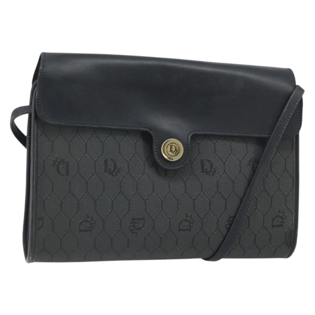 Christian Dior Vintage Honeycomb Black Coated Canvas Flap Bag: Christian Dior Vintage Honeycomb Black Coated Canvas Flap Bag This Christian Dior Vintage Honeycomb Flap Crossbody Bag is crafted from coated canvas with PVC material in black. Designed for women, it