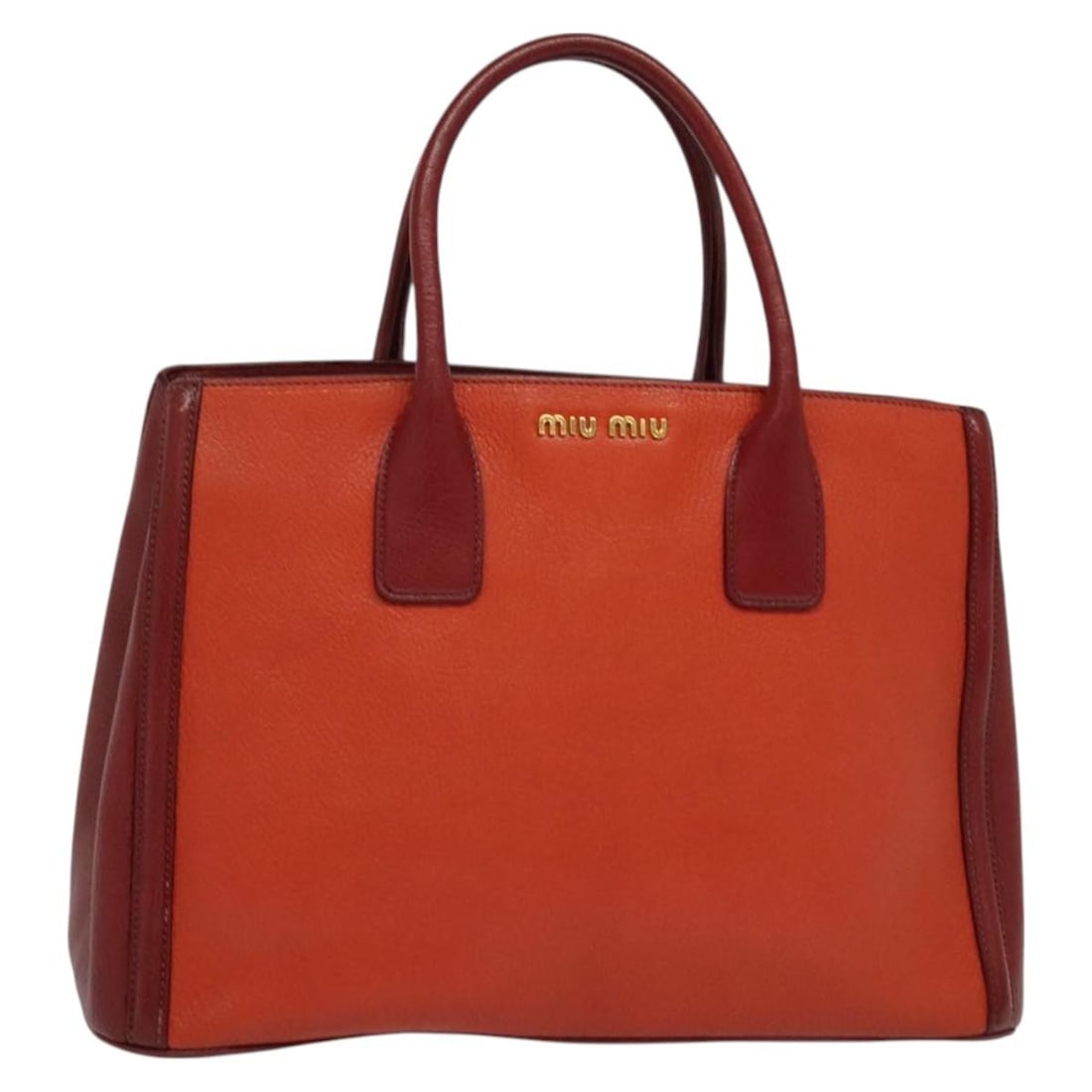 Authentic Miu Miu Red Gold Leather Hand Bag 125761: Authentic Miu Miu Red Gold Leather Hand Bag 125761 This exquisite Miu Miu handbag showcases luxurious red leather accented with gold details, perfect for adding a touch of elegance to any outfit. Craf
