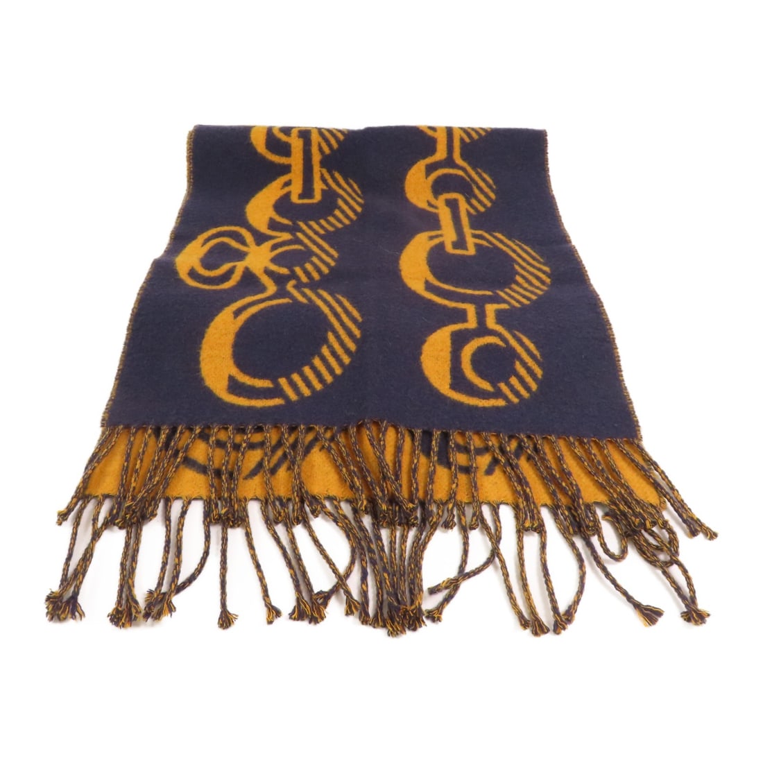 Hermes Cashmere Blue and Yellow Scarf: Hermes Cashmere Blue and Yellow Scarf This Hermes scarf is crafted from luxurious cashmere in a rich dark blue color with yellow accents. Designed for regular sizing, it offers both comfort and elegan