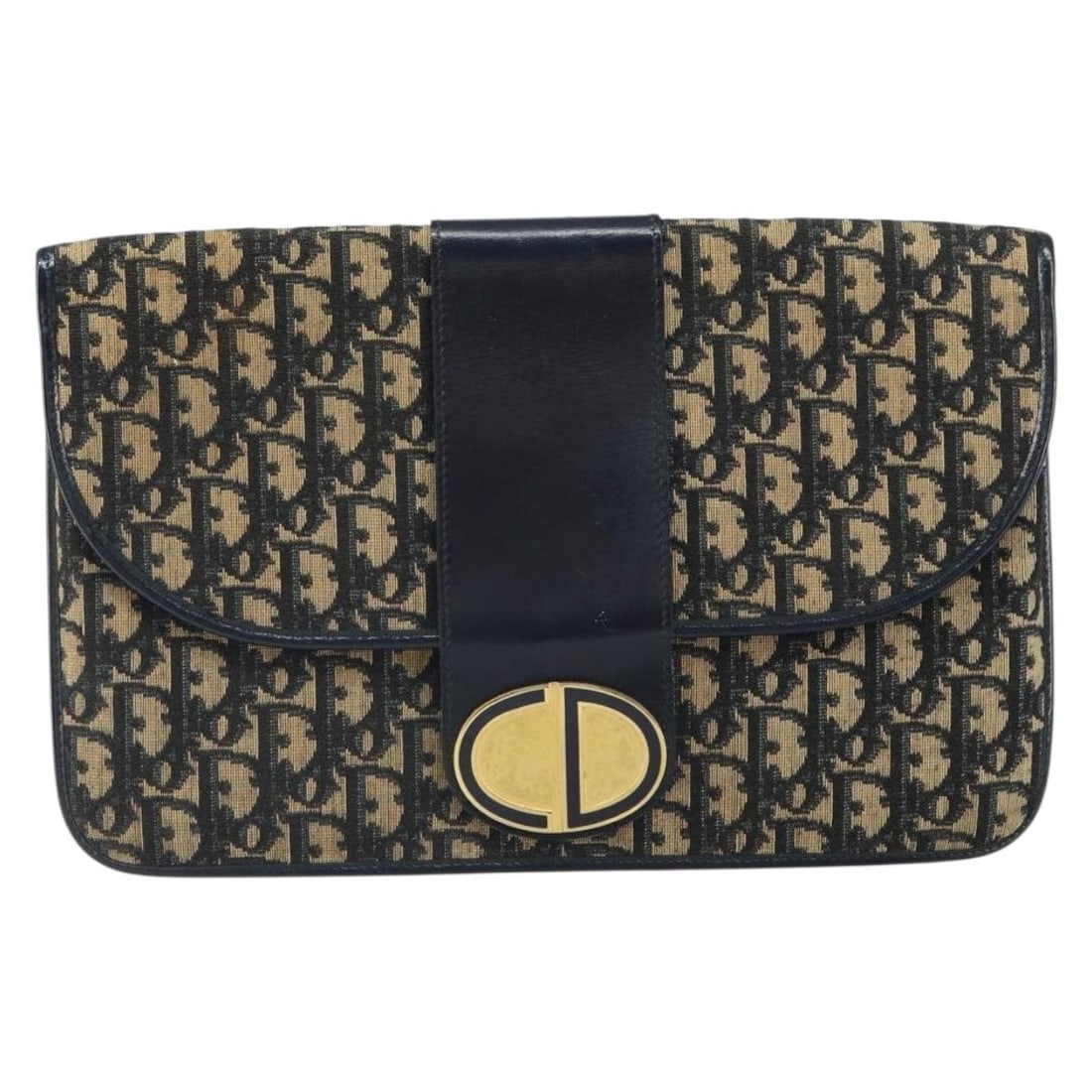 Vintage Christian Dior Navy Canvas Trotter Pouch 31cm by 20cm: Vintage Christian Dior Navy Canvas Trotter Pouch 31cm by 20cm This Christian Dior Vintage Trotter Pouch is crafted from navy canvas with leather accents. It features metal fittings and a slim profile,