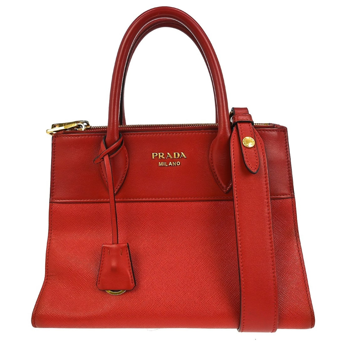 Red Leather Prada Medium Top Handle Bag with Two-Way Carry Option: Red Leather Prada Medium Top Handle Bag with Two-Way Carry Option This Prada top handle handbag features a striking red leather exterior with matching red leather lining. Designed for versatility, it