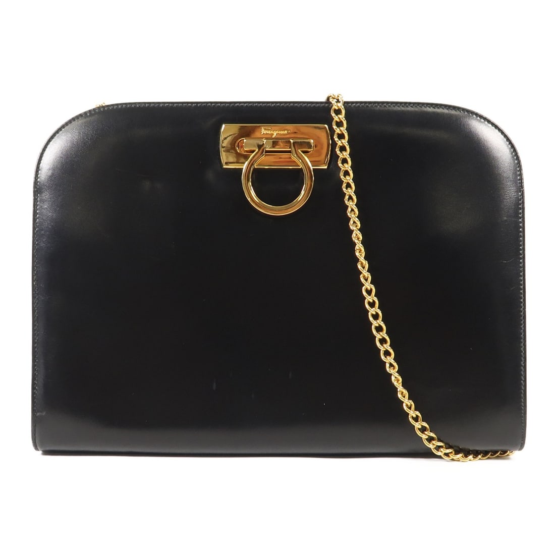 Salvatore Ferragamo Vintage Black Calfskin Chain Shoulder Bag: Salvatore Ferragamo Vintage Black Calfskin Chain Shoulder Bag This vintage Salvatore Ferragamo shoulder bag is expertly crafted from luxurious black calfskin leather. With a sleek design, it features