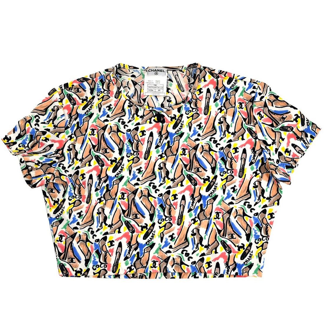 Chanel Vintage 90s Multicolor Short Sleeve Cropped T-shirt Size 44: Chanel Vintage 90s Multicolor Short Sleeve Cropped T-shirt Size 44 This vintage Chanel short sleeve cropped t-shirt is a stylish nod to 90s fashion. Made from a comfortable blend of 78% nylon and 22%