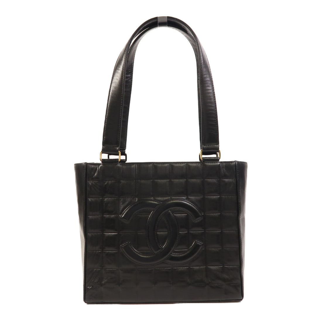 Black Calfskin CHANEL Vintage Shoulder Bag with CC and Gold Hardware: Black Calfskin CHANEL Vintage Shoulder Bag with CC and Gold Hardware This vintage Chanel shoulder bag features black calfskin leather and classic CC detailing. The bag is designed with a regular size