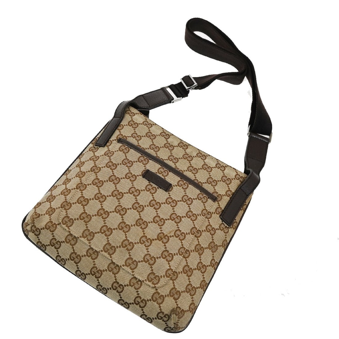 Gucci GG Canvas Zip Top Messenger Shoulder Bag with Leather Trim: Gucci GG Canvas Zip Top Messenger Shoulder Bag with Leather Trim This Gucci Zip Top Messenger bag is crafted from GG canvas with leather accents in a brown color. Designed for women, it features a pra