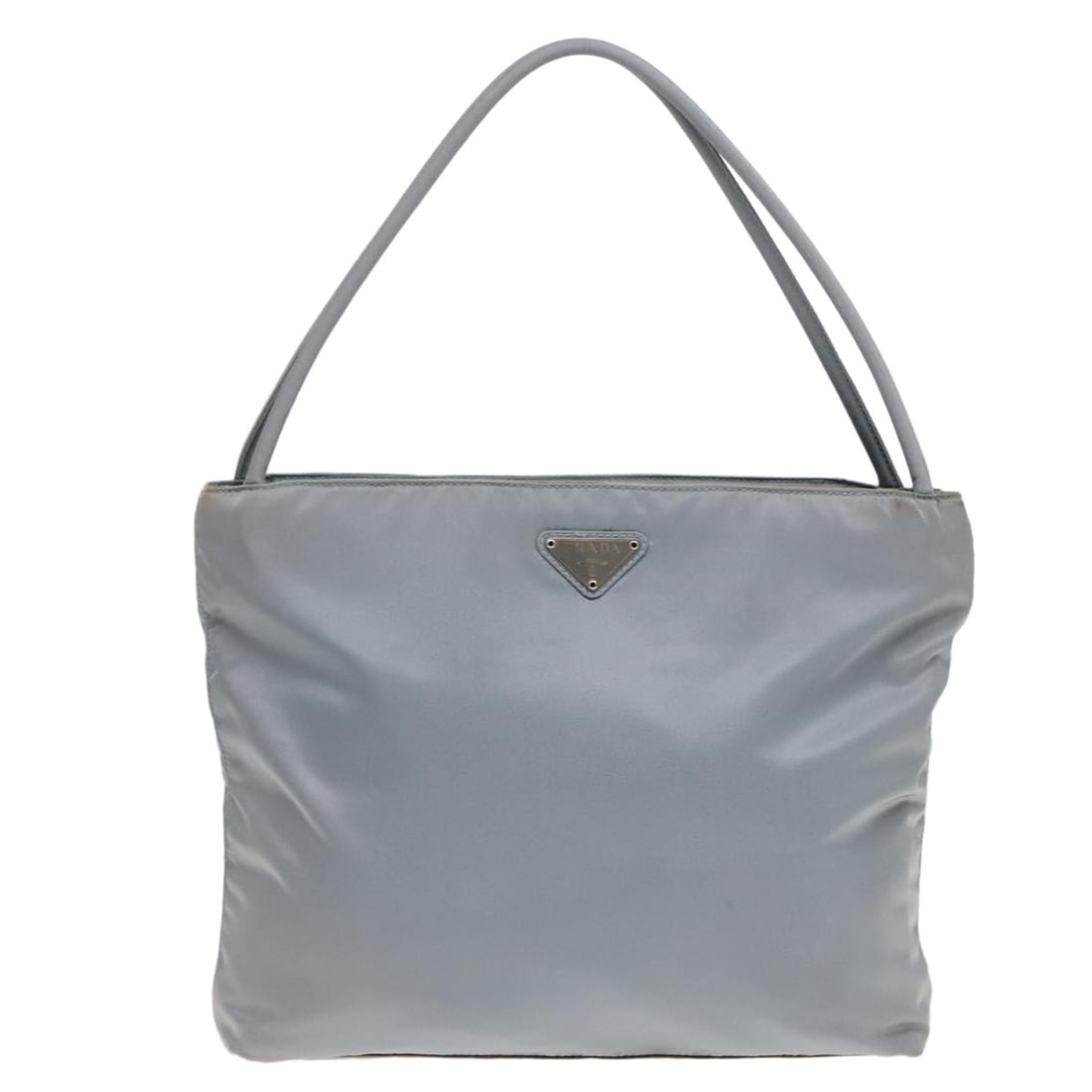 Blue Nylon Vintage Prada Tote Bag for Women: Blue Nylon Vintage Prada Tote Bag for Women This Prada Vintage Tote is crafted from blue nylon and designed for women. The bag features a spacious interior and classic tote silhouette. Signs of use in