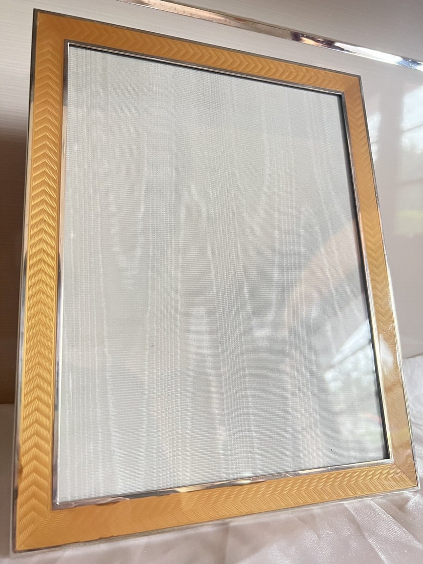 Italian Enameled Sterling Silver Frame 11 x 8.75 Inches Hallmarked 925: Italian Enameled Sterling Silver Frame 11 x 8.75 Inches Hallmarked 925 This exquisite Italian enameled sterling silver picture frame showcases remarkable detail, design, and craftsmanship. Fully signe