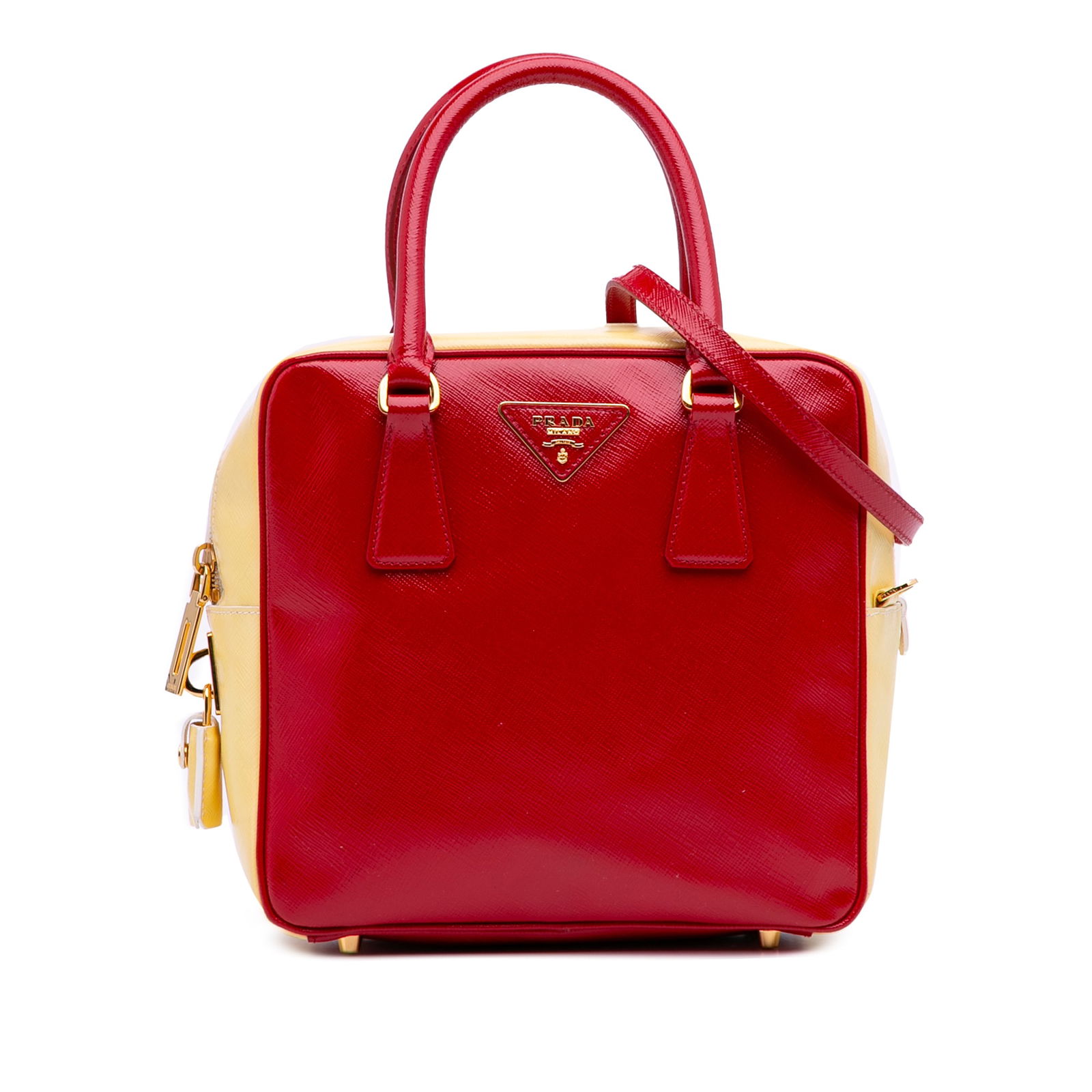 Prada Bicolor Saffiano Vernice Satchel in Red Leather: Prada Bicolor Saffiano Vernice Satchel in Red Leather This stunning Prada Bicolor Saffiano Vernice Satchel is crafted from luxurious saffiano leather, featuring a vibrant red color that adds a pop to