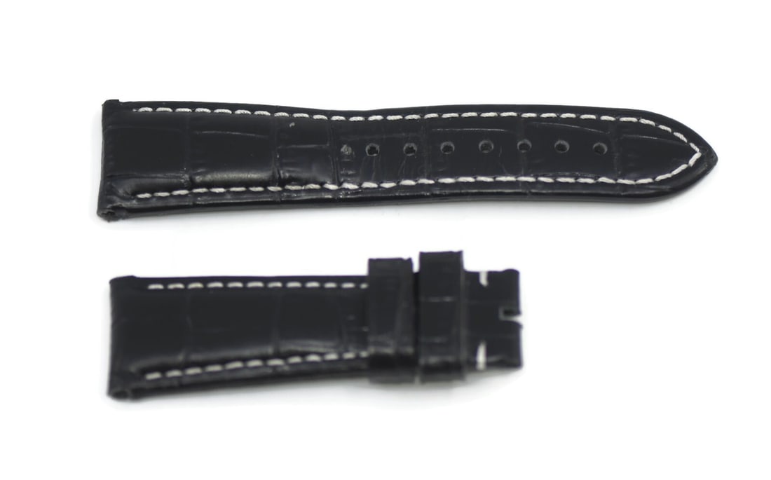 Authentic Panerai Black Leather Wristwatch Strap 24mm: Authentic Panerai Black Leather Wristwatch Strap 24mm Enhance your timepiece with this Panerai Black Leather Strap, designed for comfort and style. This pre-owned wristwatch band features a sleek blac