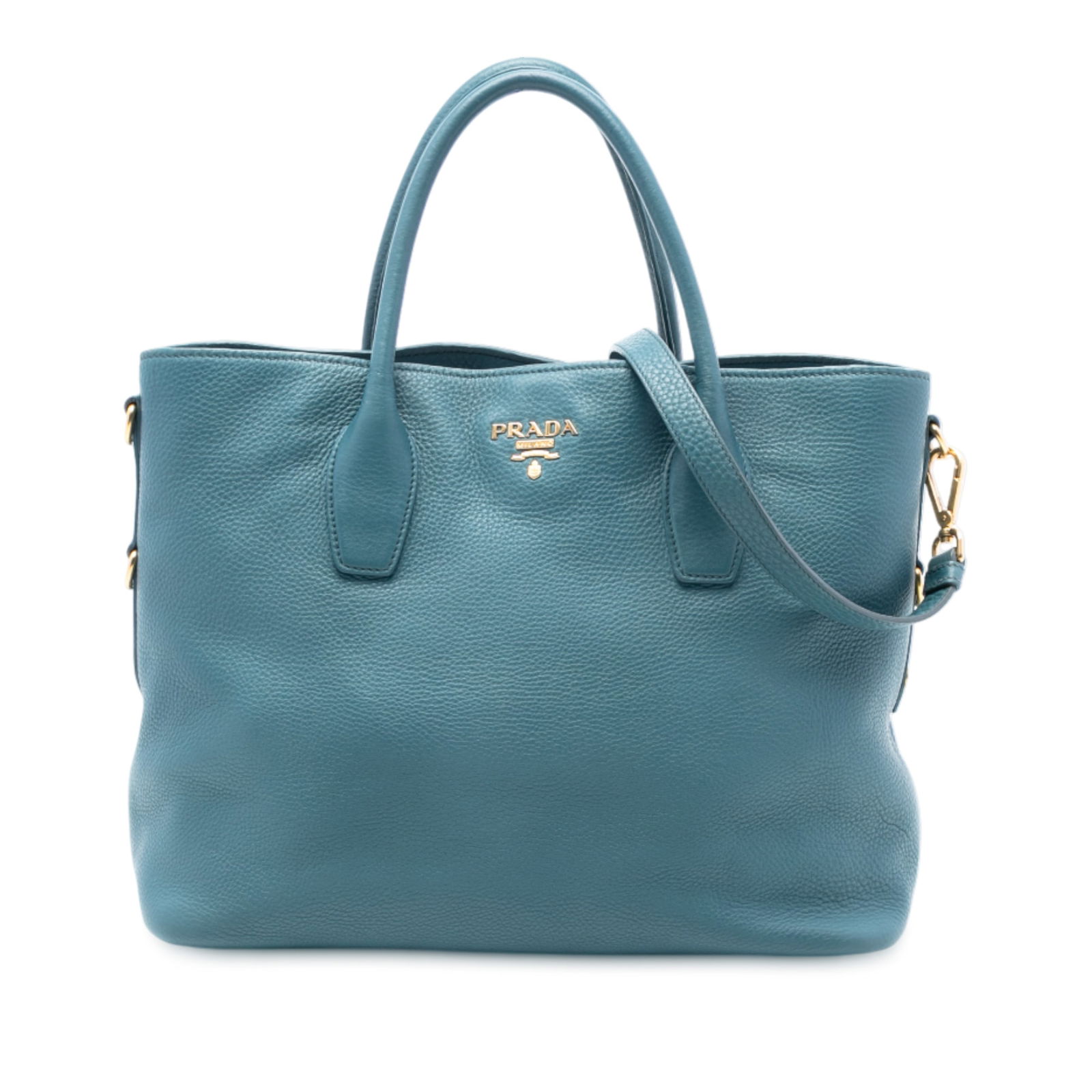 Prada Vitello Daino Blue Leather Convertible Satchel with Detachable Strap: Prada Vitello Daino Blue Leather Convertible Satchel with Detachable Strap This Prada Vitello Daino Open Convertible Tote features a blue leather body with rolled leather handles, a detachable flat st
