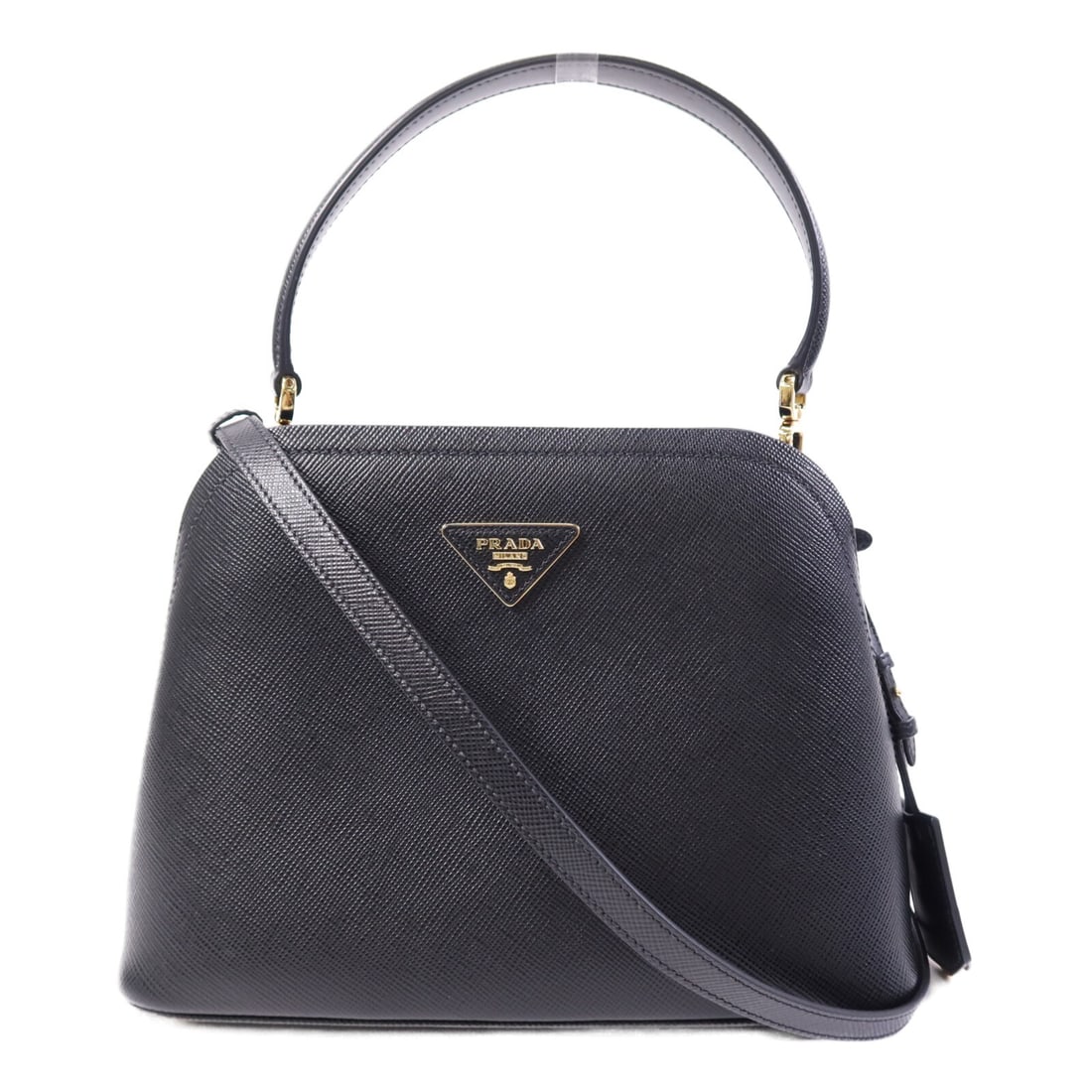 PRADA Black Calfskin 2 Way Shoulder Bag 1BA282 GHW: PRADA Black Calfskin 2 Way Shoulder Bag 1BA282 GHW This exquisite PRADA 2 Way Shoulder Bag is crafted from high-quality calfskin leather in a sophisticated black hue. With its versatile design, it can