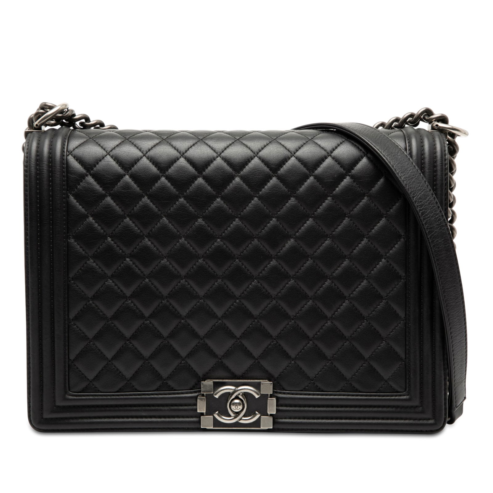 Black Lambskin Boy Flap Shoulder Bag with Quilted Design by Chanel: Black Lambskin Boy Flap Shoulder Bag with Quilted Design by Chanel This Chanel Large Boy Flap Bag features a quilted lambskin leather exterior in black, complemented by a flat leather strap with silve