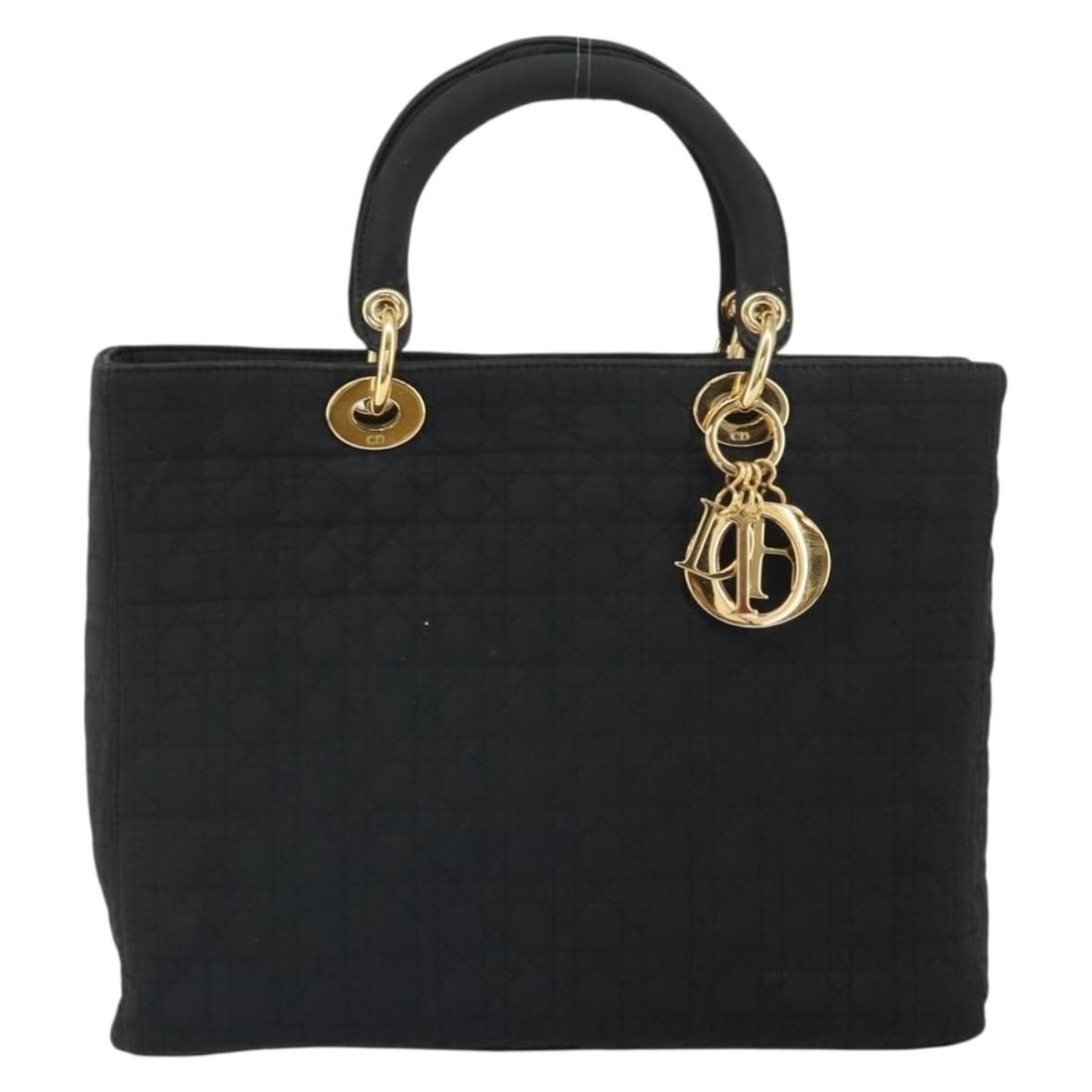Christian Dior Nylon Lady Dior Quilted Vintage Handbag: Christian Dior Nylon Lady Dior Quilted Vintage Handbag This Christian Dior Vintage Lady Dior bag features a black nylon exterior with the iconic Cannage quilt pattern. Designed for women, the bag show