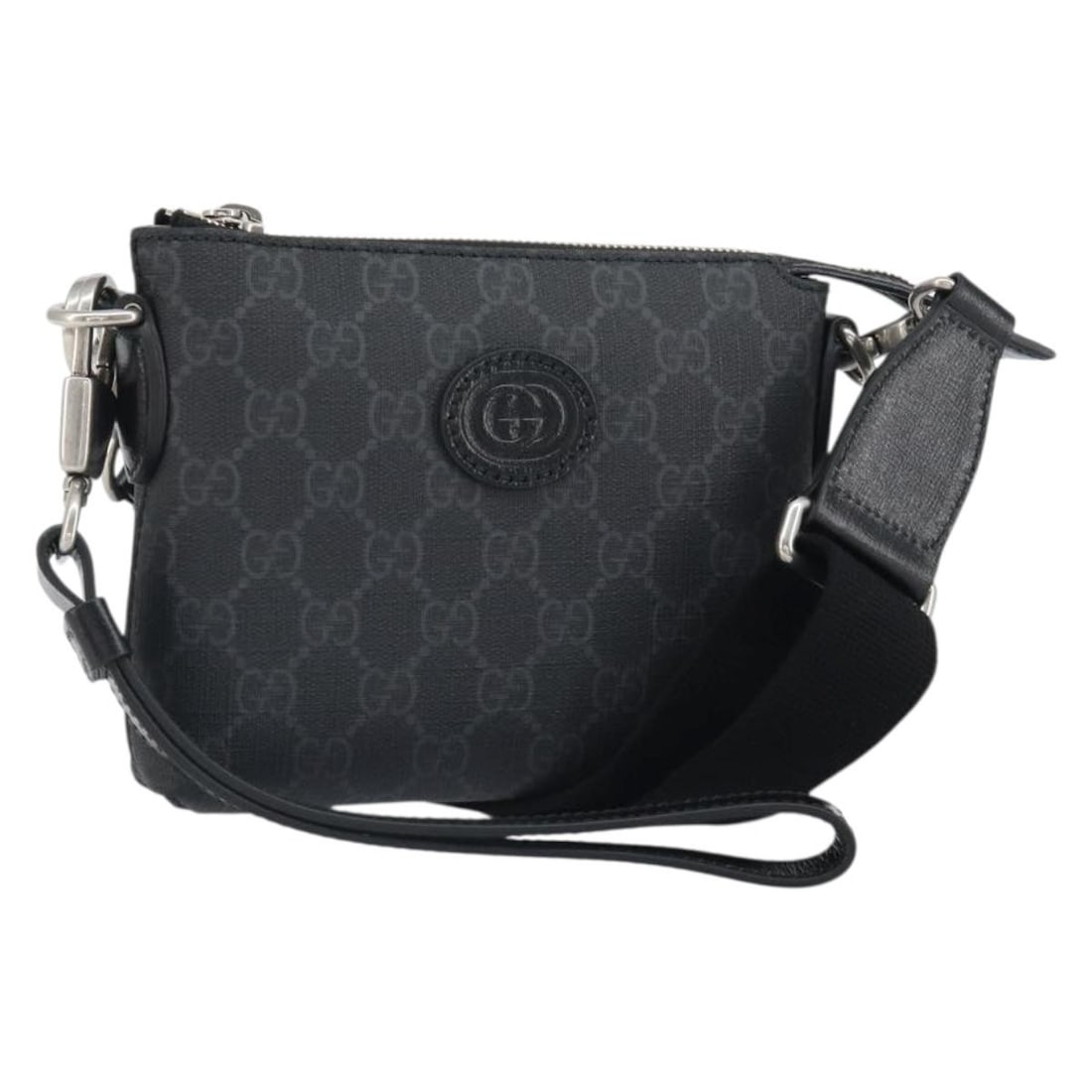 Gucci GG Supreme Black PVC Leather Shoulder Bag with Silver Accents: Gucci GG Supreme Black PVC Leather Shoulder Bag with Silver Accents This is a Gucci GG Supreme shoulder bag crafted from PVC leather and GG canvas in black and silver tones. The bag features an adjust