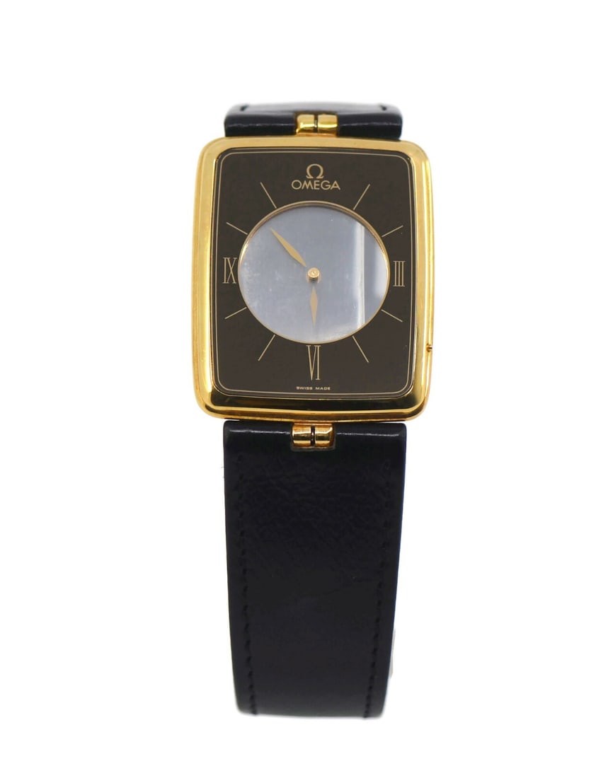 Omega La Magique Scarface 18K Yellow Gold Quartz Watch 27x35mm: Omega La Magique Scarface 18K Yellow Gold Quartz Watch 27x35mm Discover the elegance of the Omega La Magique Scarface wristwatch, a stunning timepiece crafted in 18K yellow gold. This watch features a