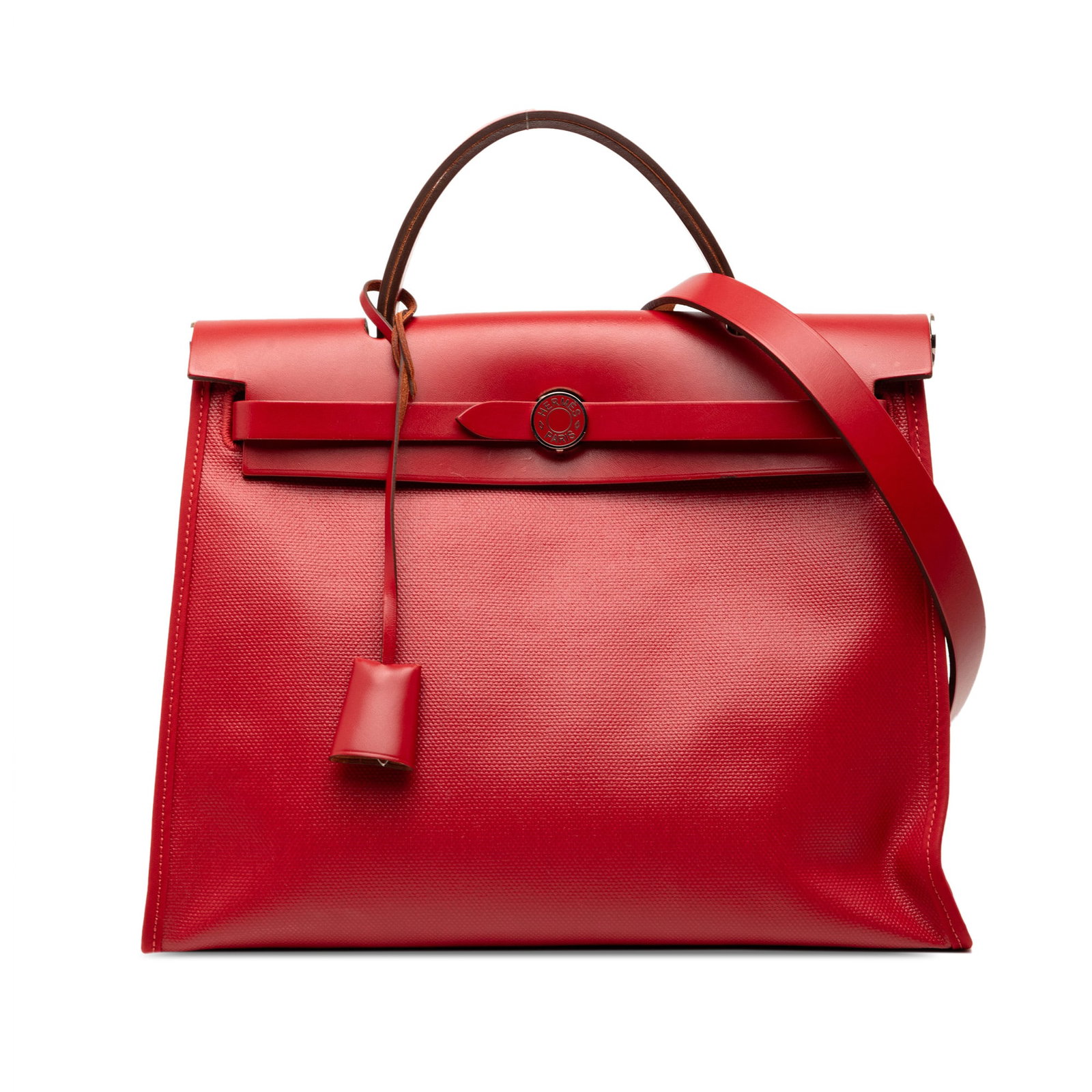 Herbag Zip 31 Red Canvas Bag with Leather Trim by Hermes: Herbag Zip 31 Red Canvas Bag with Leather Trim by Hermes The Hermes H Berline and Hunter Herbag Zip 31 is a stylish bag crafted with a canvas body and leather trim. It features a flat leather top hand