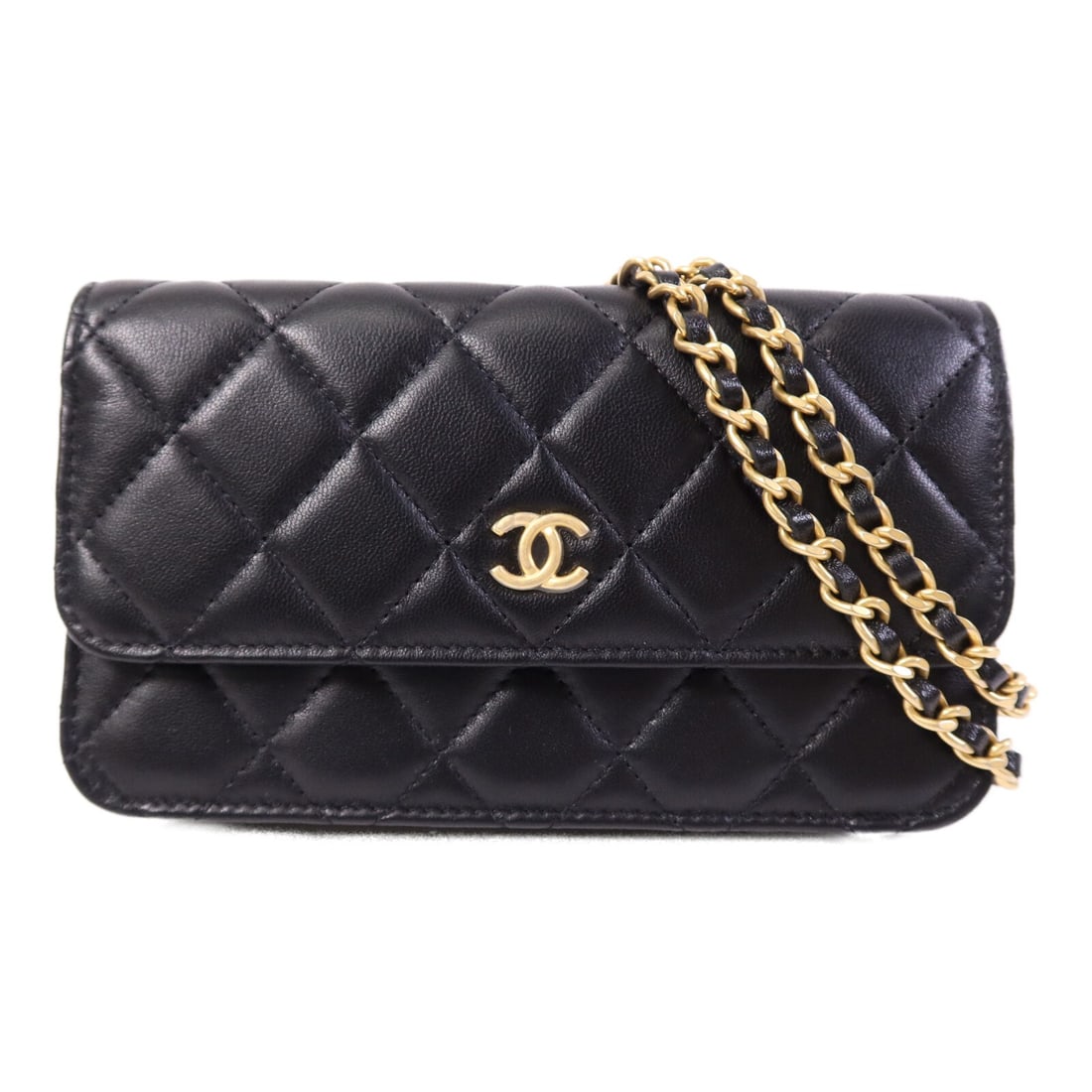 Black Lambskin Chanel Wallet On Chain Shoulder Bag with Gold Hardware: Black Lambskin Chanel Wallet On Chain Shoulder Bag with Gold Hardware This Chanel CC Wallet On Chain (WOC) shoulder bag is crafted from luxurious black lambskin leather. The bag features a classic des