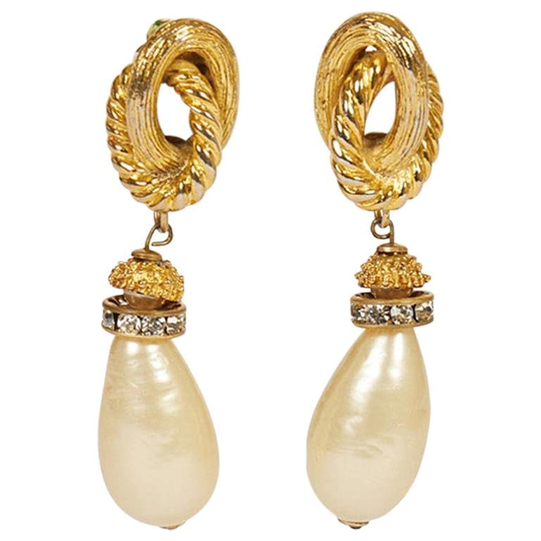 Chanel 70s Vintage Pearl Dangle Earrings with Gripoix and Crystals: Chanel 70s Vintage Pearl Dangle Earrings with Gripoix and Crystals These stunning Chanel 70s Pearl Dangle Earrings are a highly collectible piece of jewelry, originating from France and manufactured i