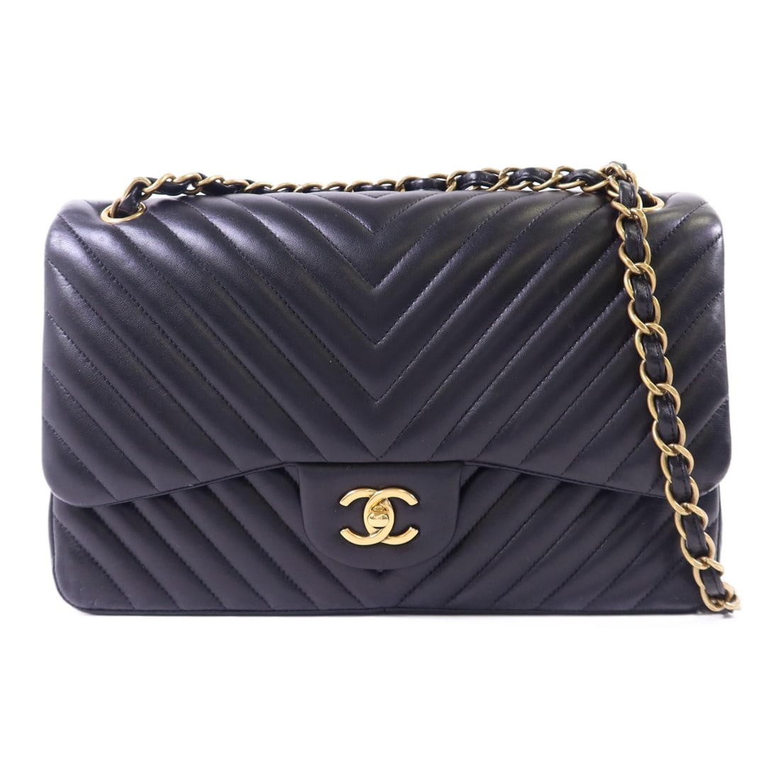 Black Lambskin Chanel Jumbo Shoulder Bag with Gold Hardware 2 Way: Black Lambskin Chanel Jumbo Shoulder Bag with Gold Hardware 2 Way This CHANEL CC Classic Jumbo 2-way shoulder bag is crafted from luxurious black lambskin leather. Featuring a versatile design, it can