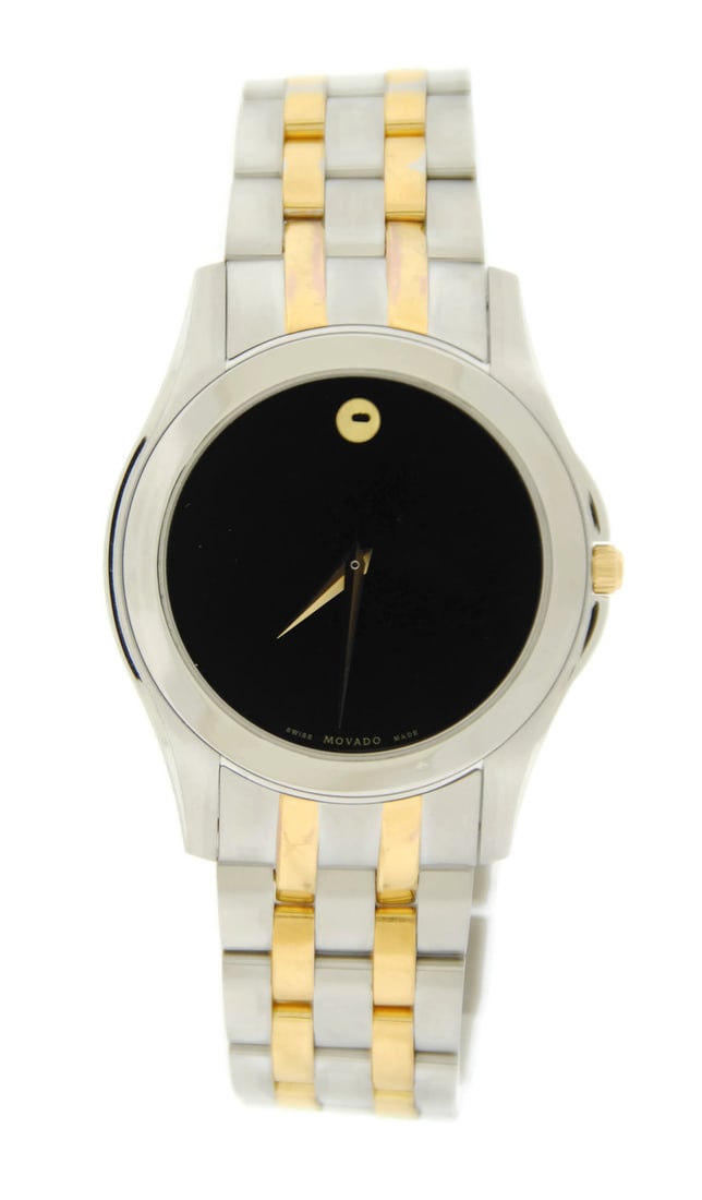 Movado Museum Two Tone Gold Plated Stainless Steel Watch: Movado Museum Two Tone Gold Plated Stainless Steel Watch Experience the elegance of the Movado Museum Two Tone Stainless Steel Watch, a perfect blend of style and functionality. This exquisite wristwa